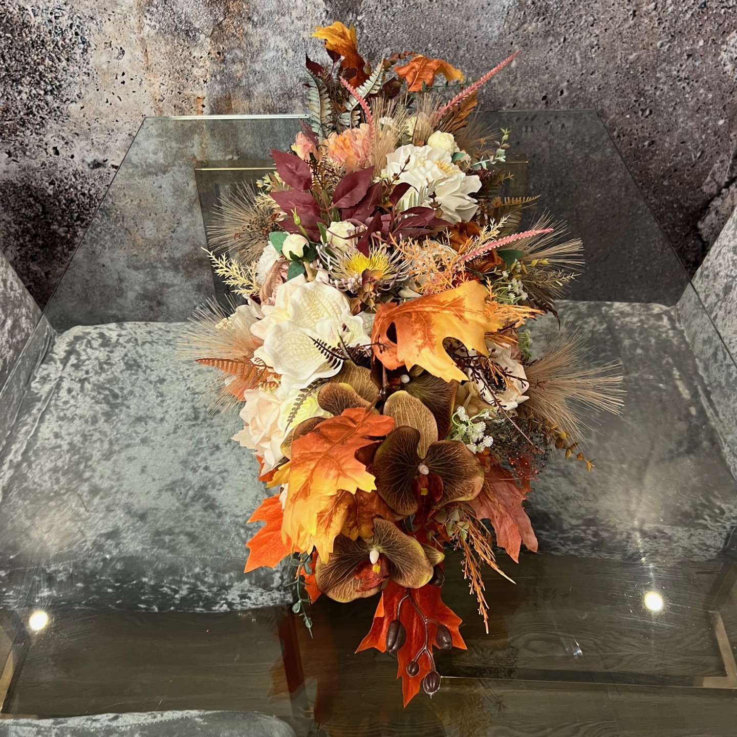 Thanksgiving table centrepiece with artificial flowers