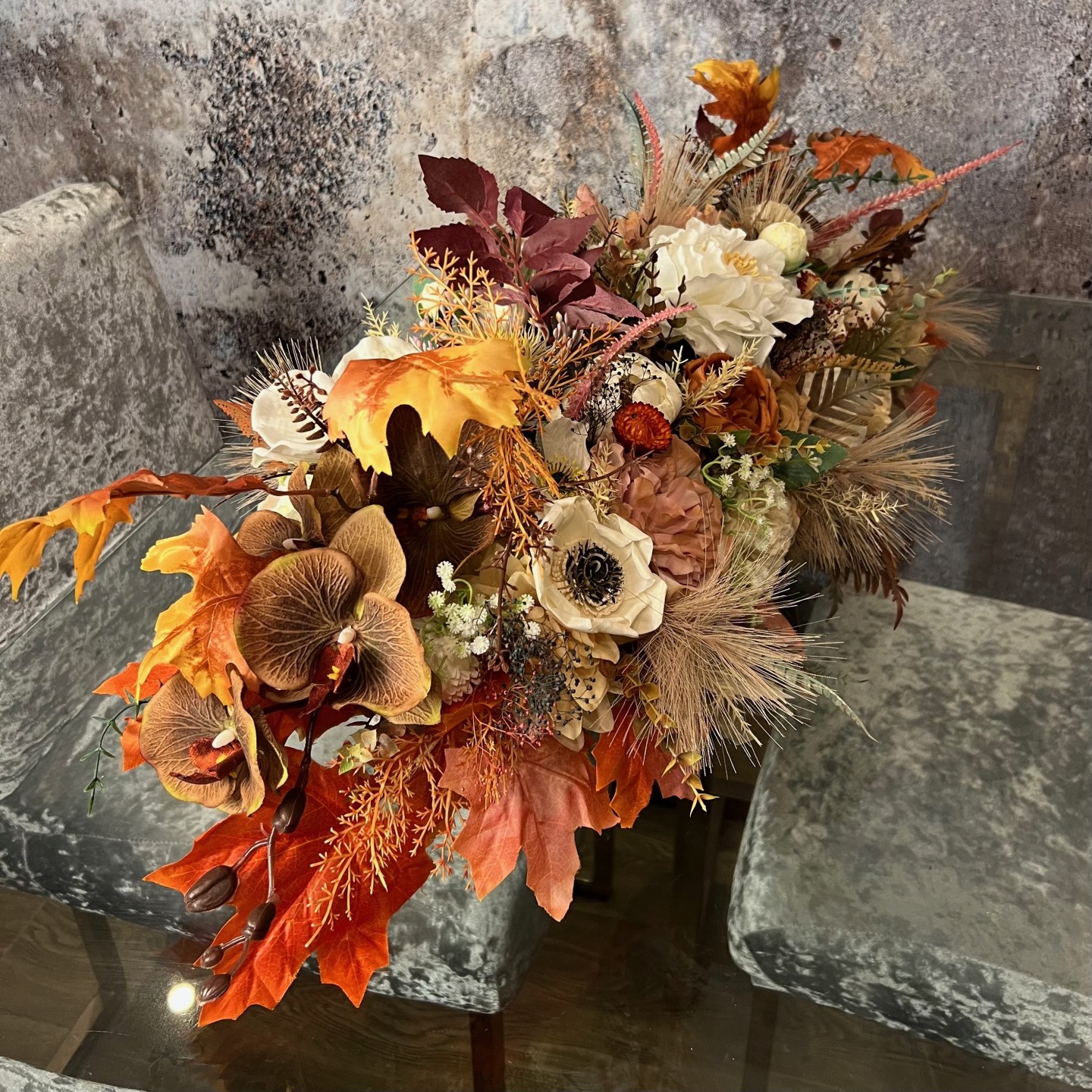 Thanksgiving table centrepiece with artificial flowers
