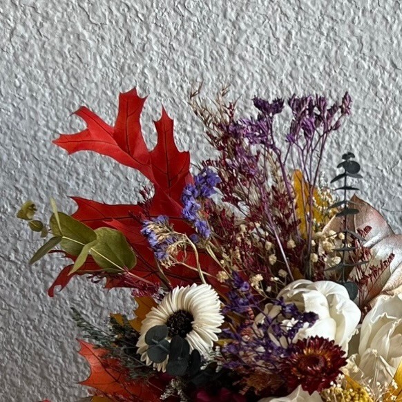 Thanksgiving arrangement in a pumpkin with preserved flowers Thanksgiving arrangement in a pumpkin with preserved flowers