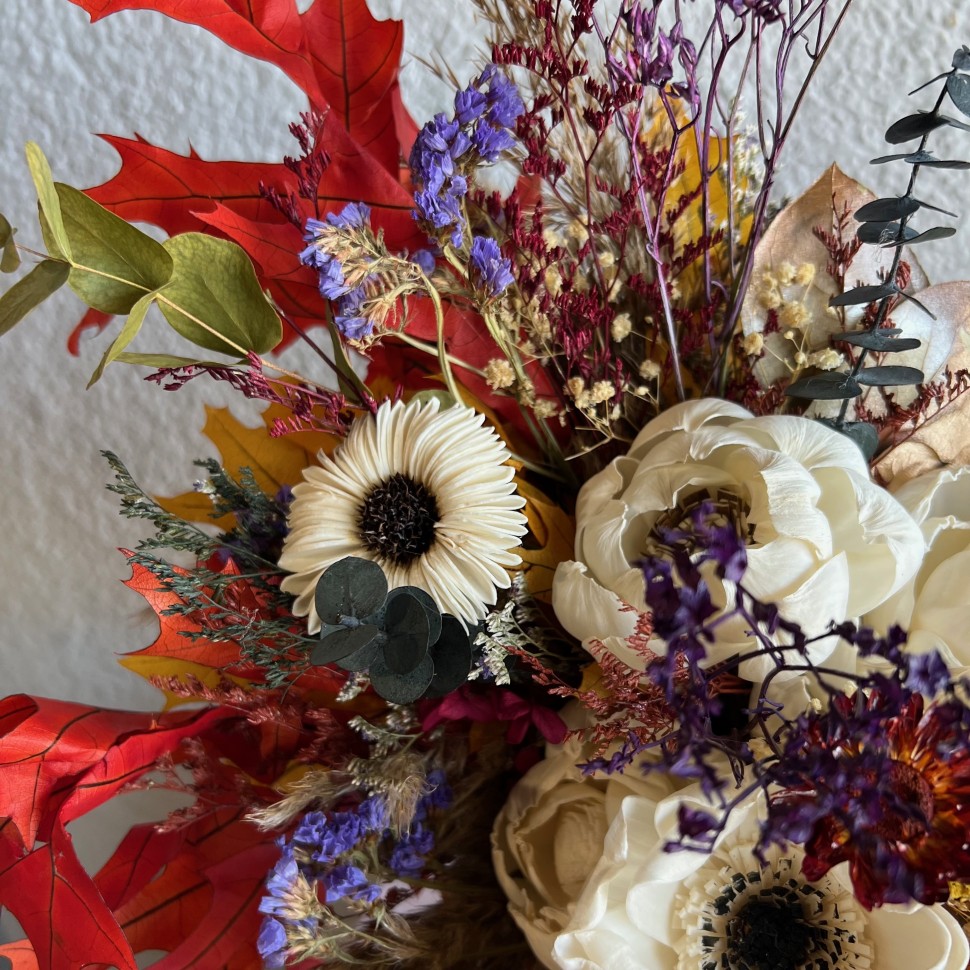 Thanksgiving arrangement in a pumpkin with preserved flowers