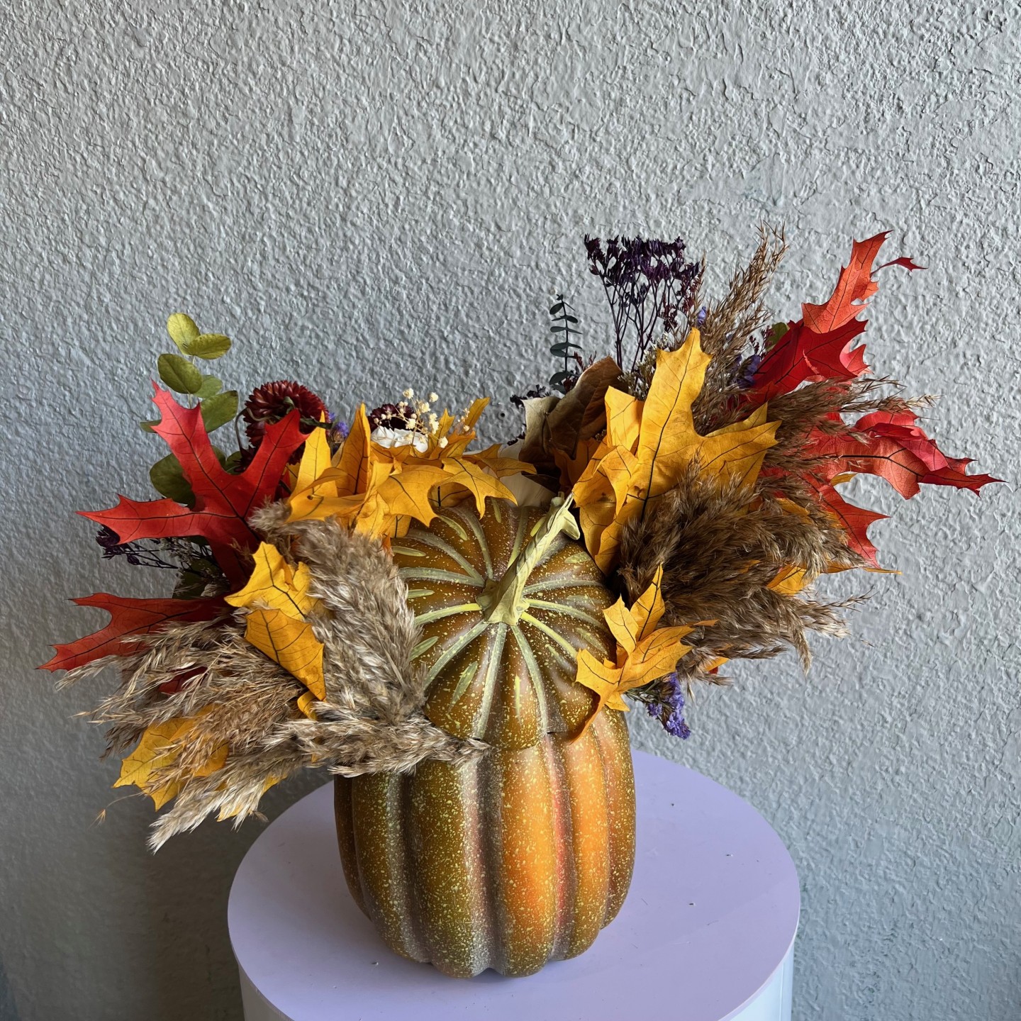 Thanksgiving arrangement in a pumpkin with preserved flowers Thanksgiving arrangement in a pumpkin with preserved flowers