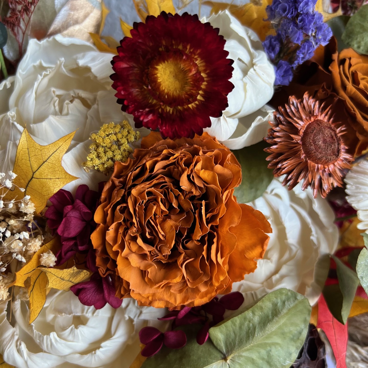 Thanksgiving arrangement in a pumpkin with preserved flowers Thanksgiving arrangement in a pumpkin with preserved flowers