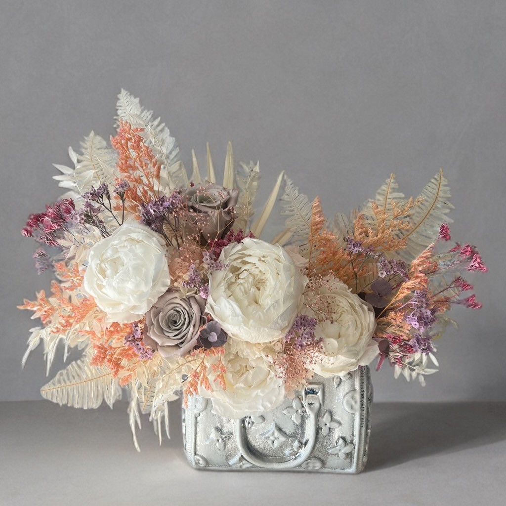 Silver Bag vase with Preserved Peonies and Roses