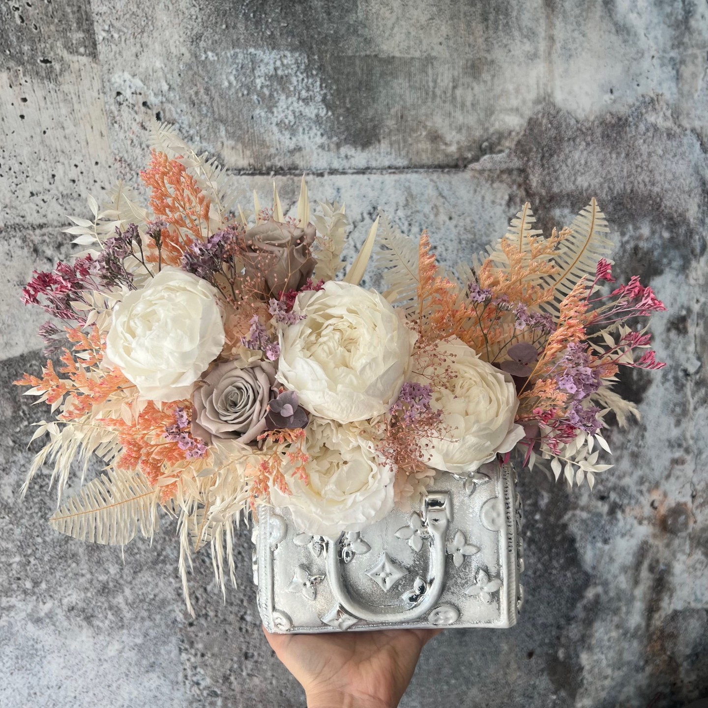Silver Bag vase with Preserved Peonies and Roses