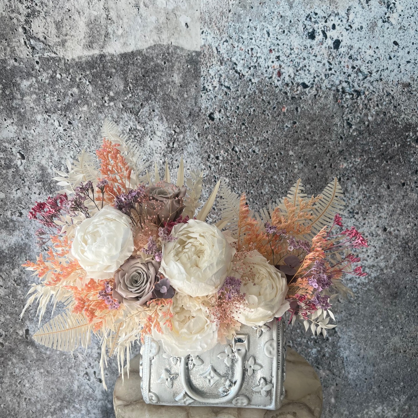 Silver Bag vase with Preserved Peonies and Roses