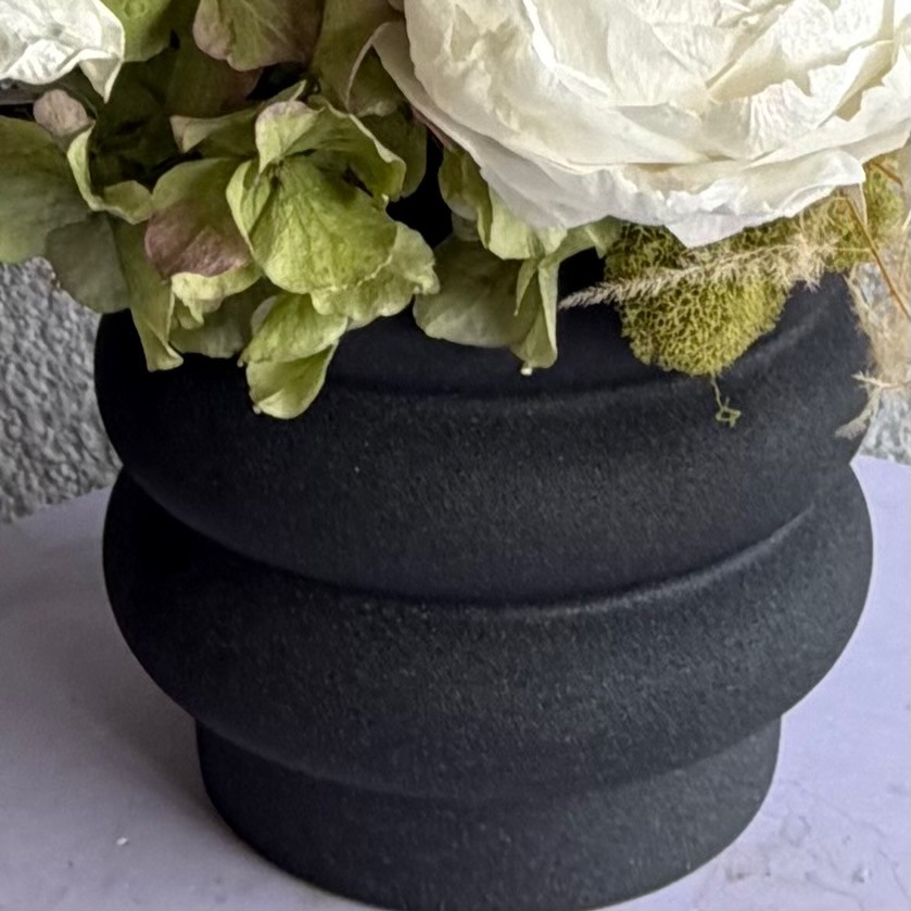 Black vase with White Preserved Peonies and Anturiums