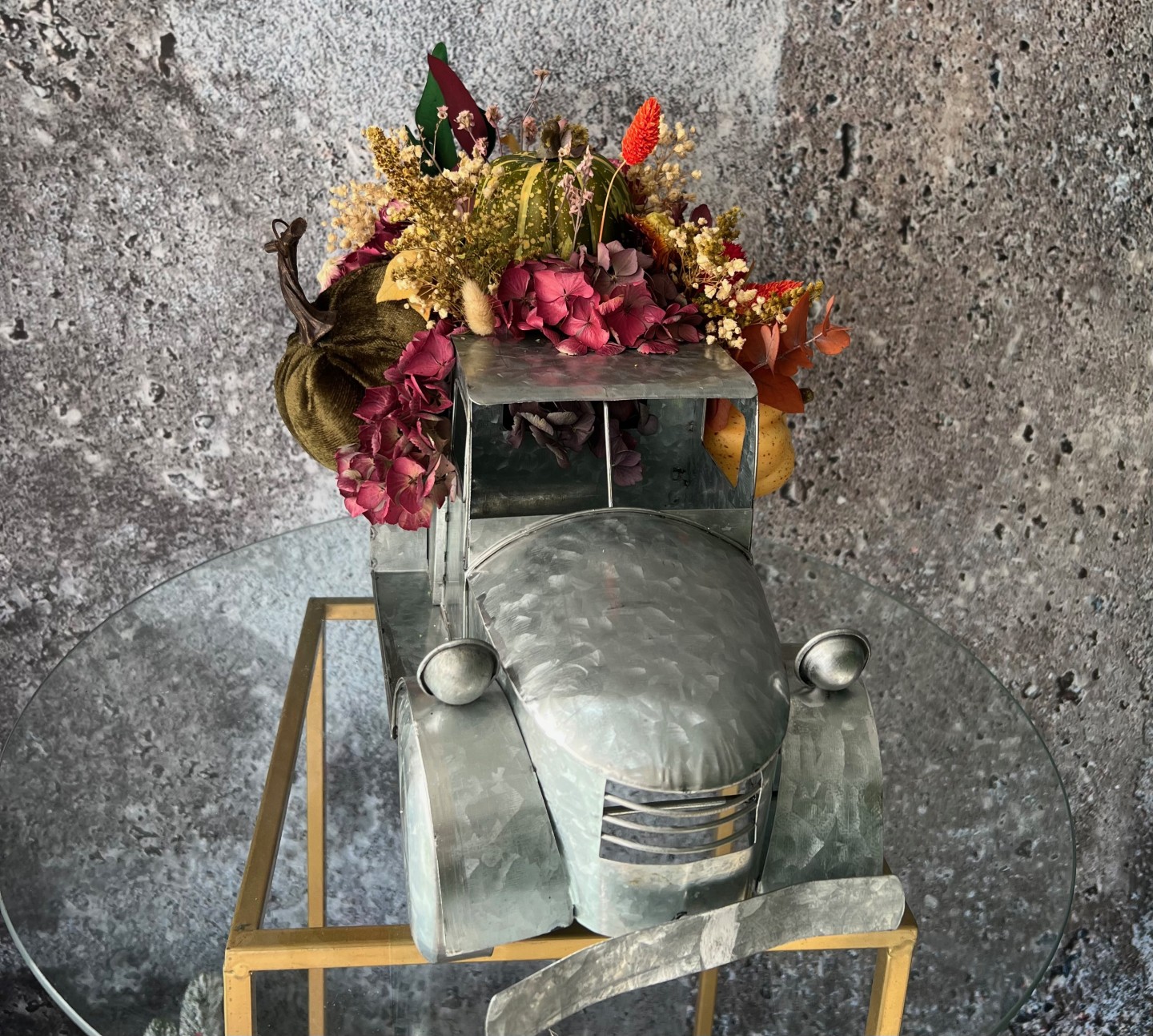 Thanksgiving arrangement with preserved flowers in iron car
