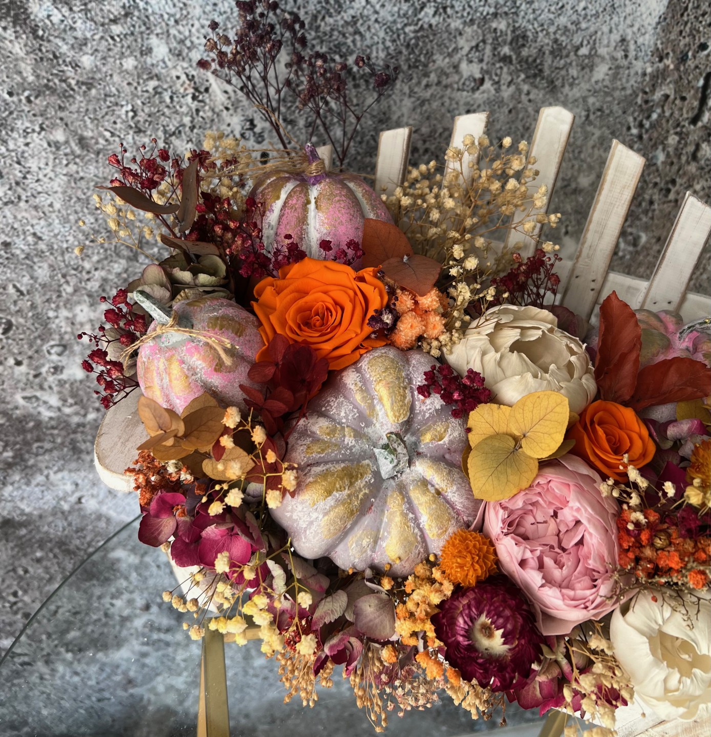Thanksgiving arrangement with preserved flowers in bench Thanksgiving arrangement with preserved flowers in bench