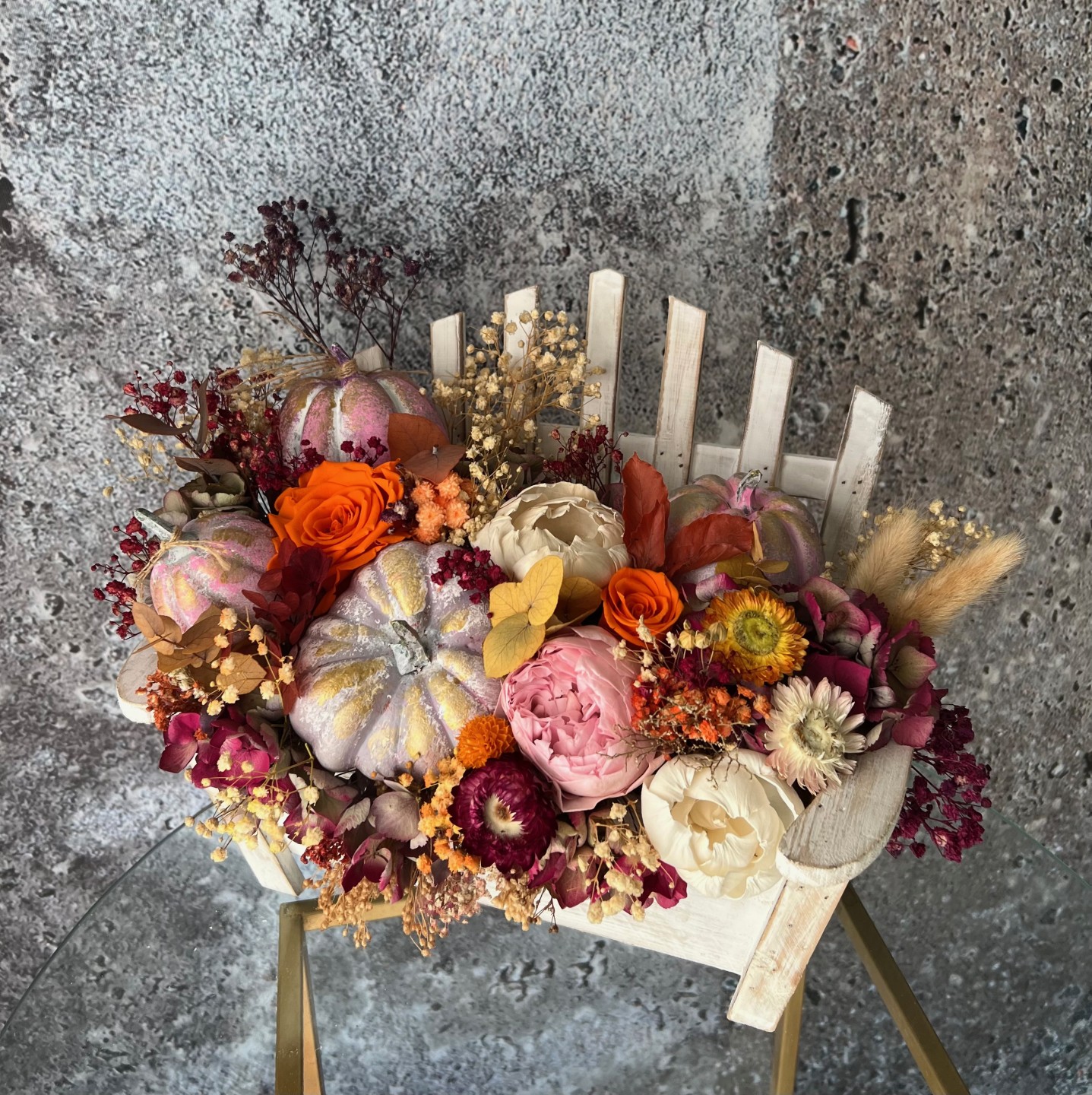Thanksgiving arrangement with preserved flowers in bench Thanksgiving arrangement with preserved flowers in bench
