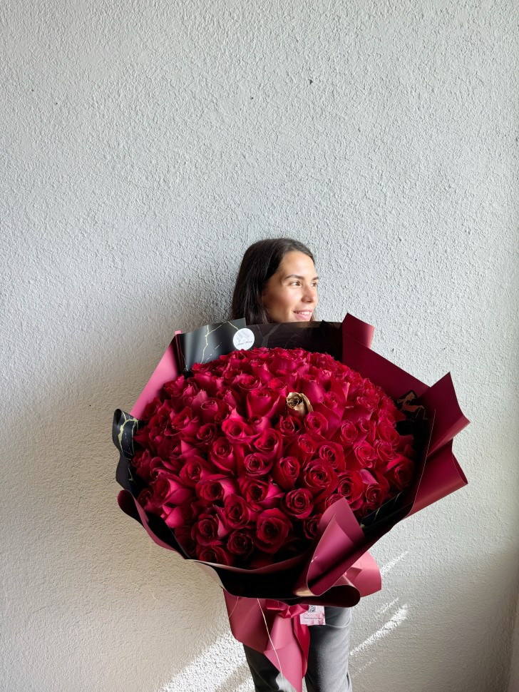 100 Red Roses With 1 Gold Rose In The Middle Hand-Tied Bouquet