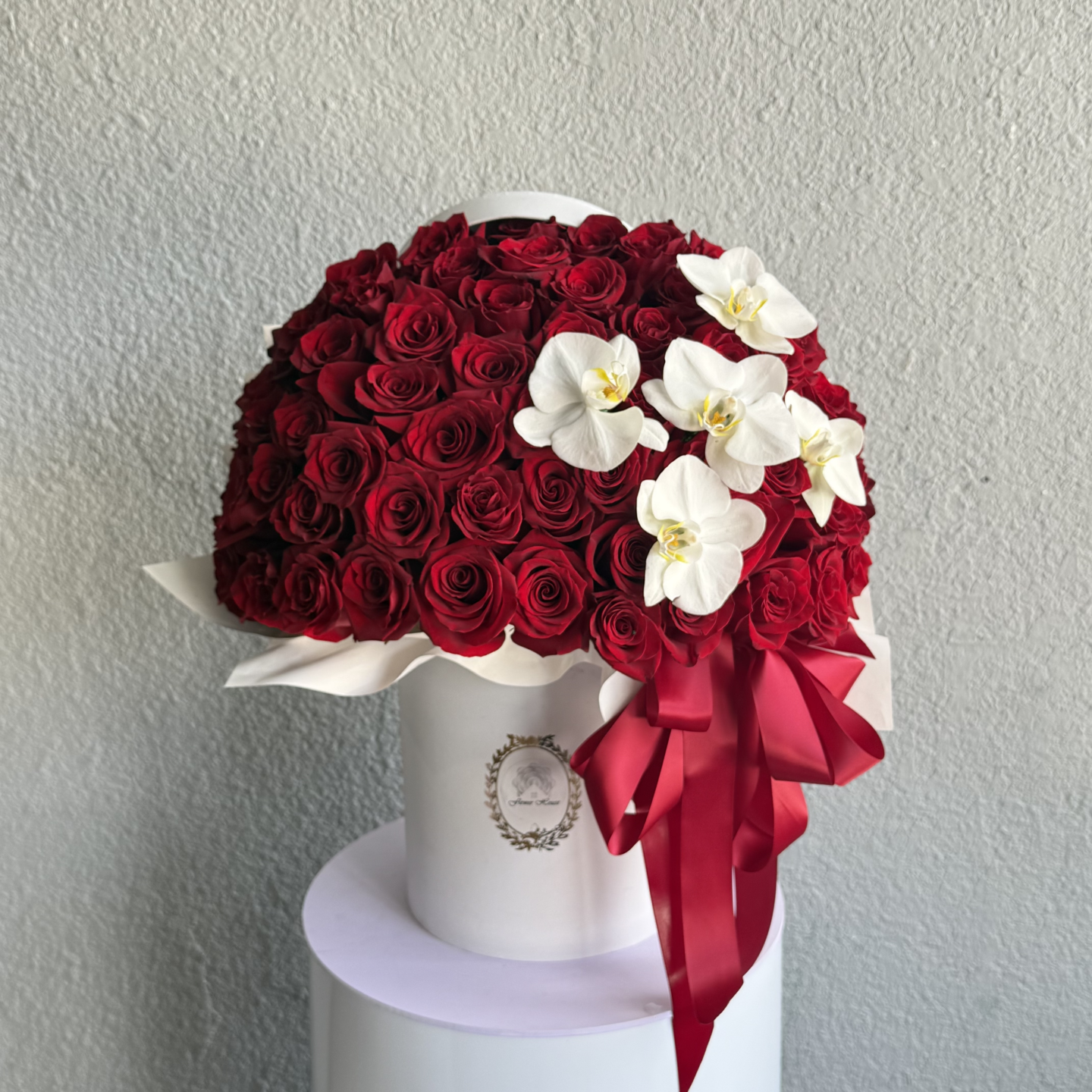 Ruby Cascade Flower Box – Red Roses & White Phalaenopsis Orchids Ruby Cascade Flower Box – Red Roses & White Phalaenopsis Orchids