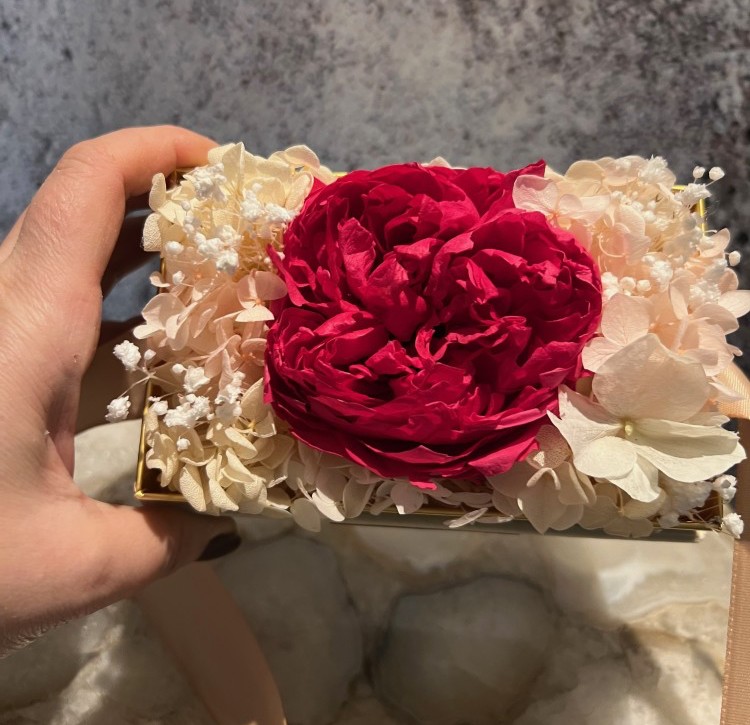 Single preserved hot pink peony in acrylic box