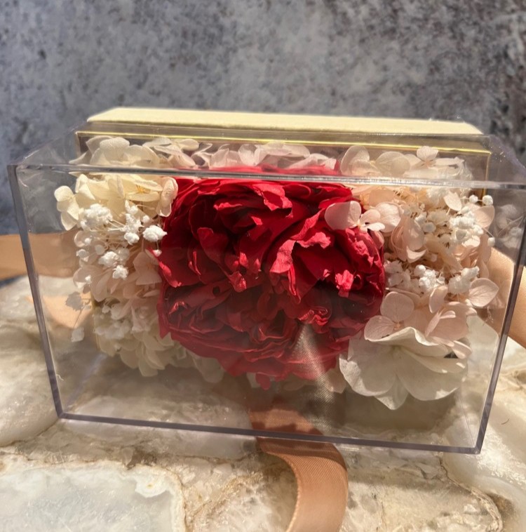 Single preserved hot pink peony in acrylic box